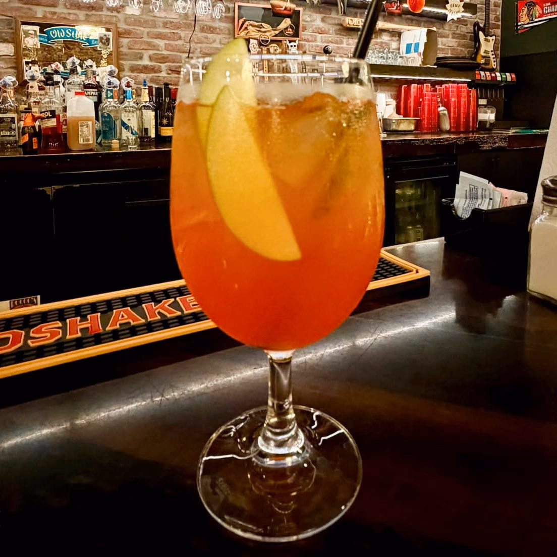 A red spritz in a glass